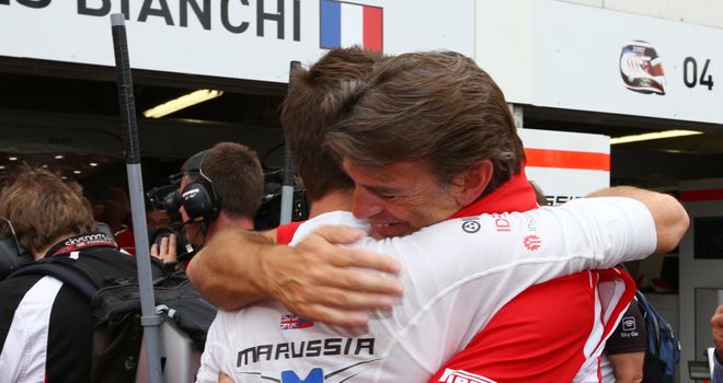 Jules Bianchi celebrates with Graeme Lowdon