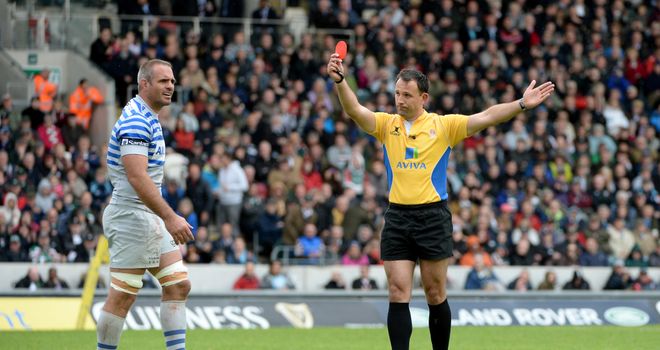 Justin Melck is shown the red card by referee Greg Garner
