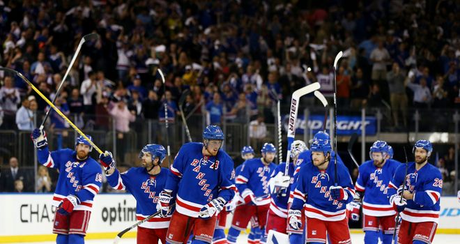 The New York Rangers celebrate their 3-1 win over the Pittsburgh Penguins