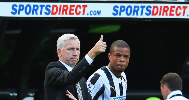 Alan Pardew (l): Remains confident of securing Loic Remy's services