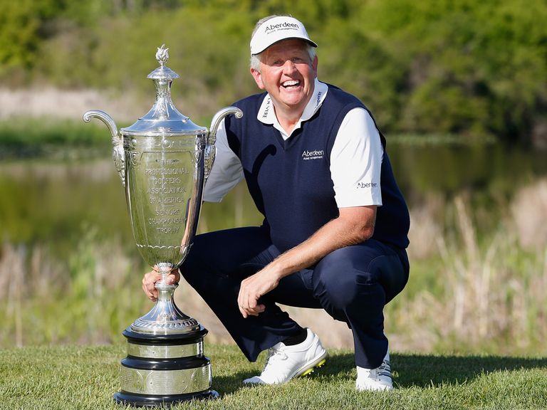 Colin Montgomerie poses with the Alfred S. Bourne Trophy
