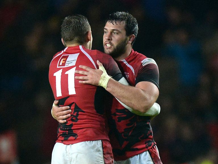 Nick Scott celebrates with team mate Nathan Vella