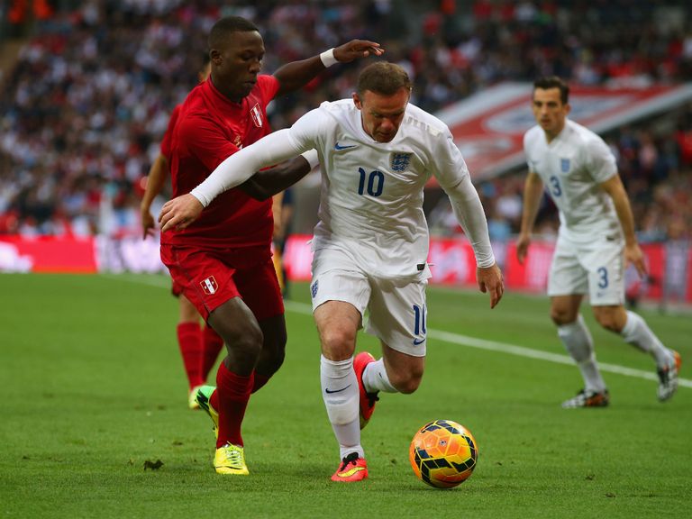 Wayne Rooney in action against Peru