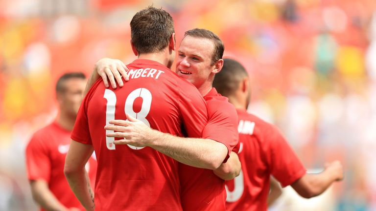 Rickie Lambert and Wayne Rooney: Celebrate during England's 2-2 draw with Ecuador