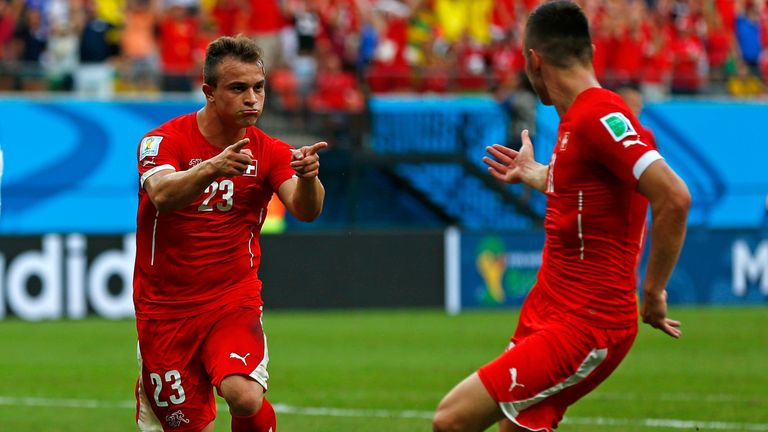 Xherdan Shaqiri: Celebrates with team-mate Josip Drmic