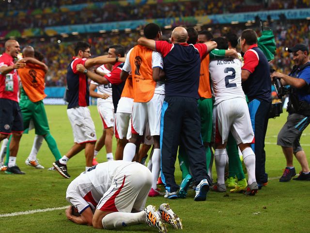 Costa Rica celebrate reaching the quarter-finals