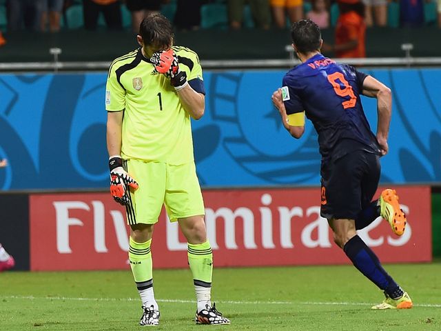 Iker Casillas can't look as Robin van Persie celebrates