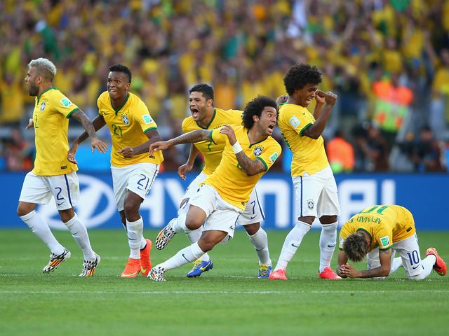 Brazil celebrate after defeating Chile in a penalty shootout