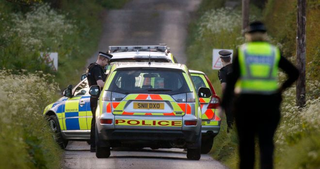 Police investigate the scene at Coldstream where two people after thought to have died