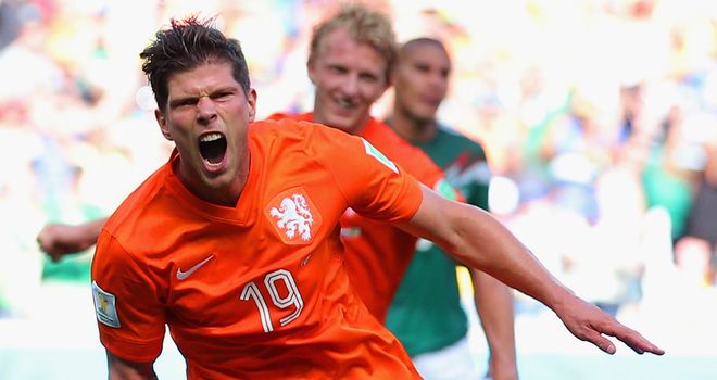 Klaas-Jan Huntelaar wheels away to celebrate after his last-gasp winner