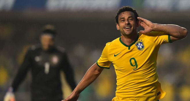 Fred: Striker celebrates scoring the only goal as Brazil beat Serbia