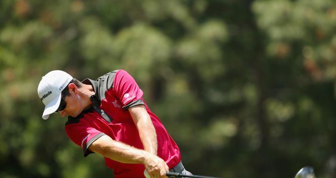 Justin Rose hits his tee shot on the second hole on his way to a third round 70
