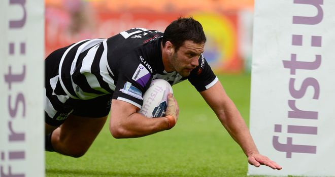 Danny Galea dives over for a Widnes try