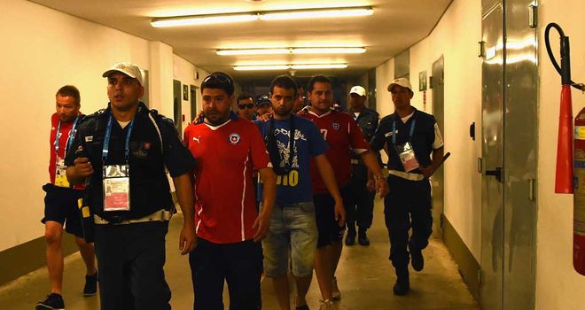 Chile fans: Were lead out of the ground by security and police