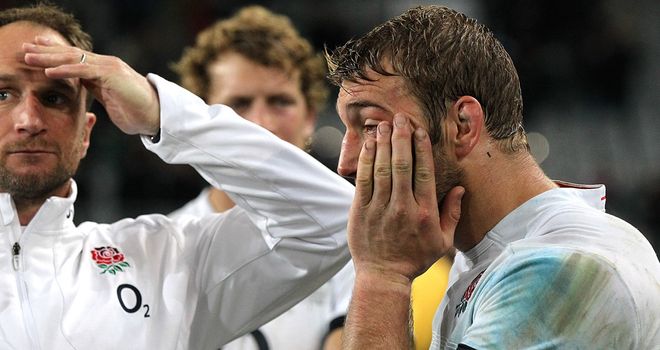 A dejected England after losing 27-28 in Dunedin