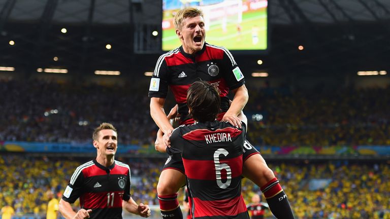 Toni Kroos: Celebrates with Sami Khedira after scoring in Germany's demolition of Brazil