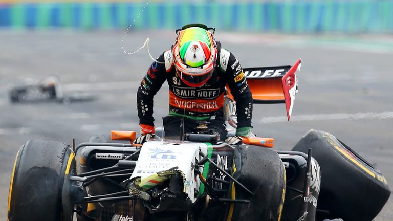 Sergio Perez crashed heavily into the pitwall