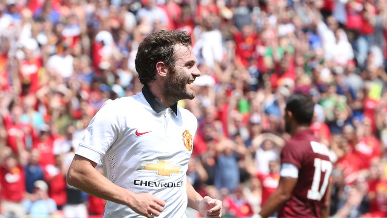 Mata celebrates his goal