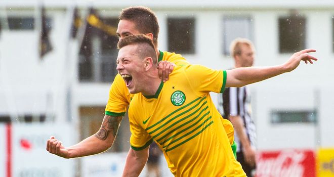 Callum McGregor celebrates scoring the winner in Iceland