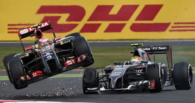 Pastor Maldonado gets airborne alongside Esteban Gutierrez