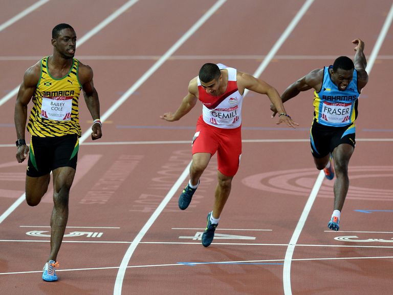 Jamaica's Kemar Bailey Cole (left) wins ahead of England's Adam Gemili