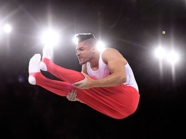 England's Louis Smith performs on the parallel bars
