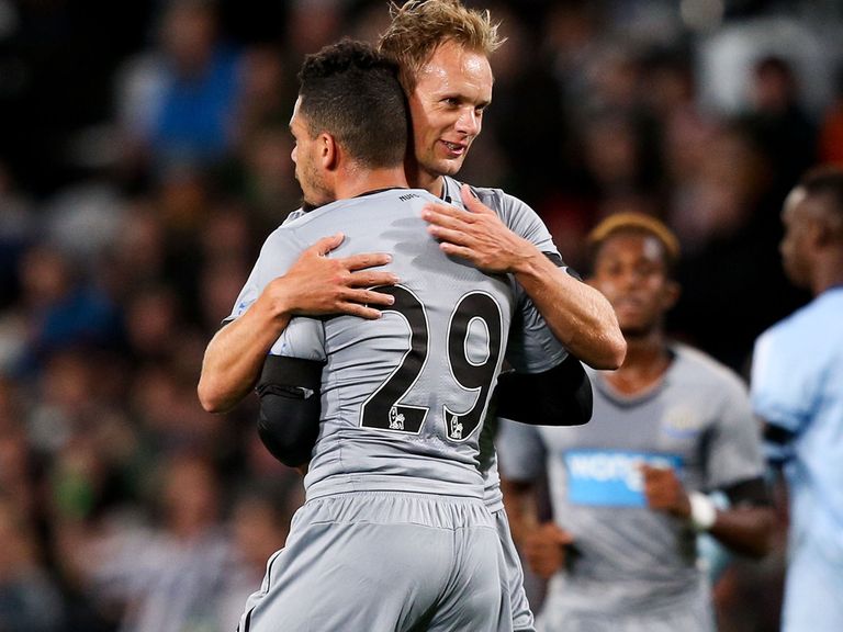 Siem de Jong celebrates his goal with Emmanuel Riviere