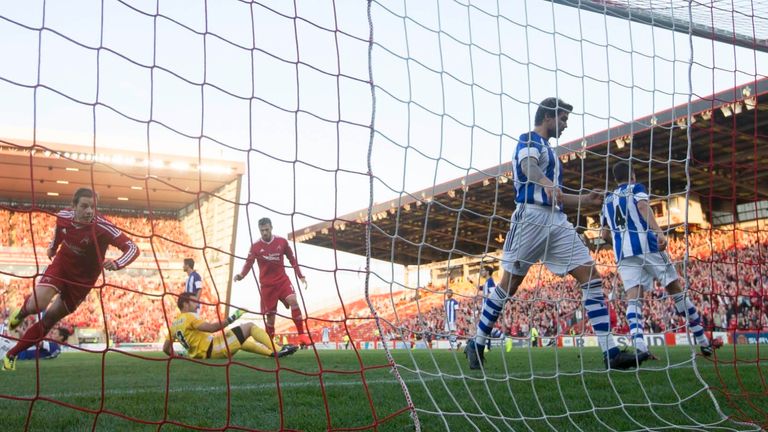 Peter Pawlett scores for Aberdeen, but Real Sociedad triumphed 3-2 on the night