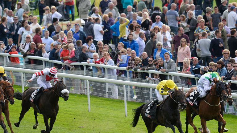 Oisin Murphy and Absolutely So (yellow silks) take the City of York Stakes.