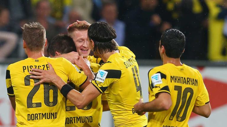 Marco Reus of Borussia Dortmund congratulates Sokratis Papastathopoulos on his goal