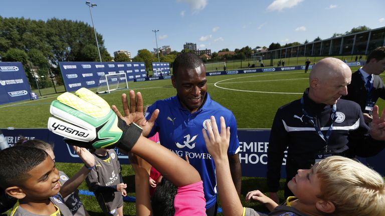 Wes Morgan of Leicester City participates in a training session with young people during the Official Premier League Season Launch