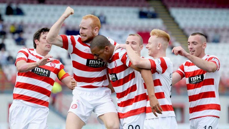 Hamilton's Mickael Antoine Curier celebrates with team-mates after giving his side the 2-0 lead over Ross County