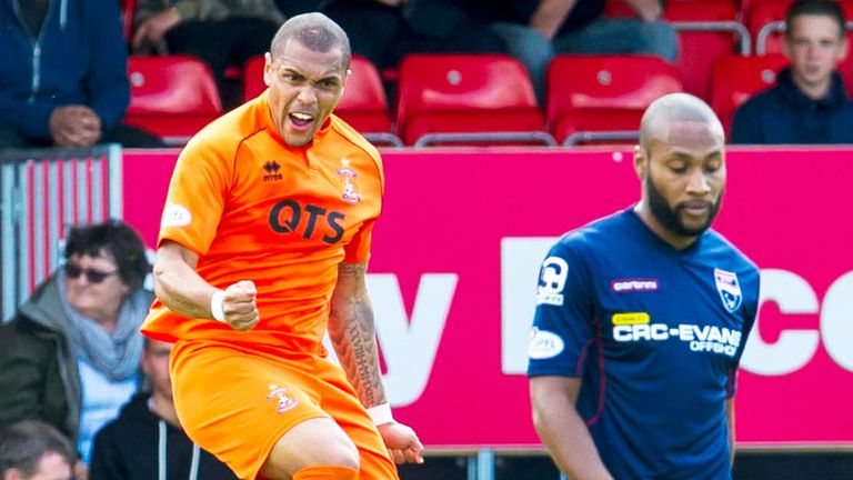 Josh Magennis: Kilmarnock striker celebrates his opening goal against Ross County