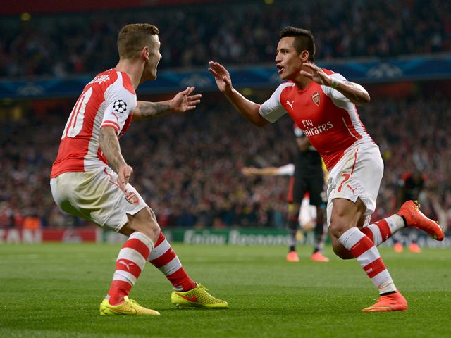 Arsenal's Alexis Sanchez celebrates scoring with Jack Wilshere 