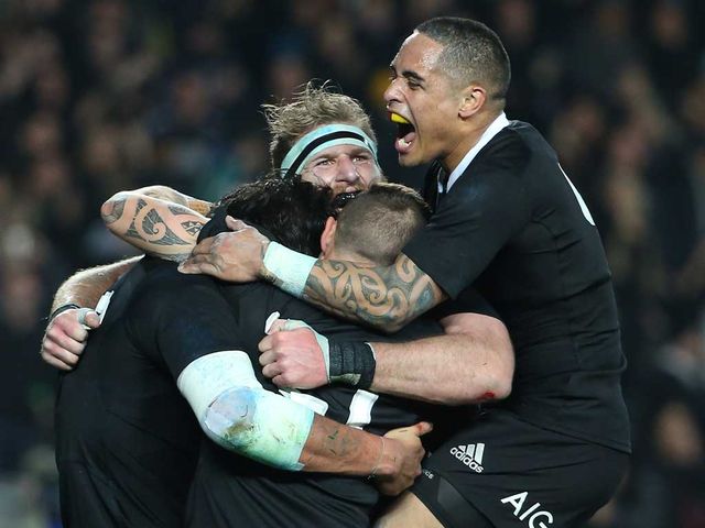 The All Blacks celebrate as they win the Bledisloe Cup