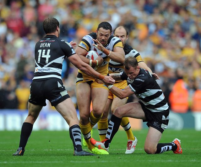 Kevin Brown and Chris Dean tackle Frankie Mariano