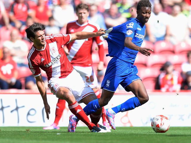 Middlesbrough's George Friend and Birmingham's Demarai Gray in action