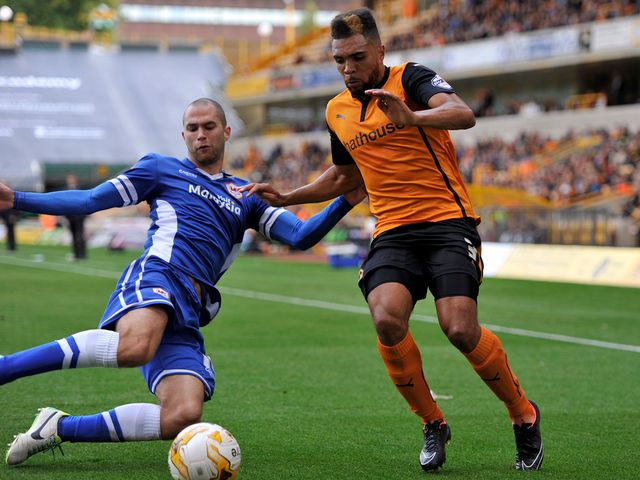 Scott Golbourne is tackled by Matthew Connolly