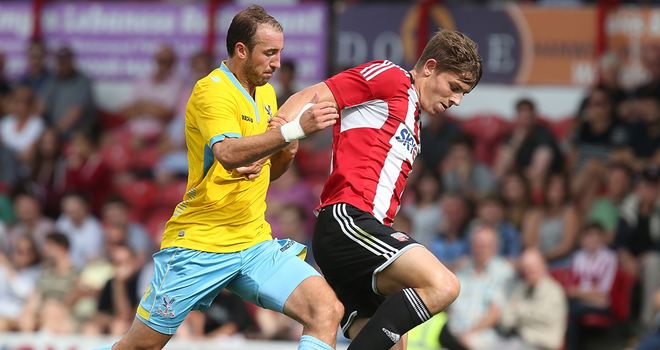 James Tarkowski: Holds off Palace goalscorer Glenn Murray