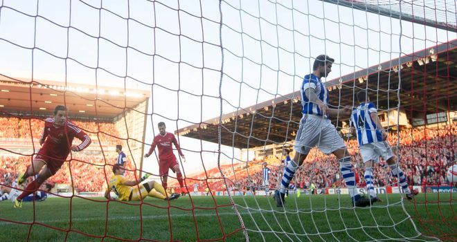 Peter Pawlett scores for Aberdeen, but Real Sociedad triumphed 3-2 on the night