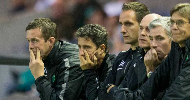 Celtic manager Ronny Deila and his dejected backroom team