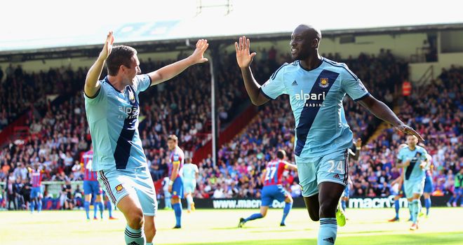 Carlton Cole (R): Celebrates with fellow goalscorer Stewart Downing
