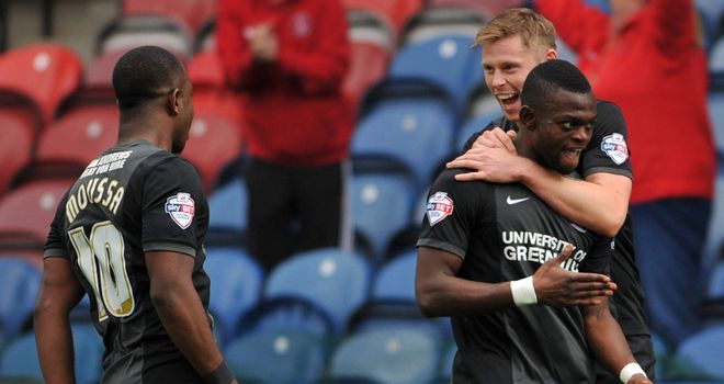 Igor Vetokele (right): Celebrates Charlton's late equaliser at Huddersfield