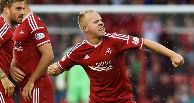Nicky Low celebrates his goal for Aberdeen against Partick Thistle