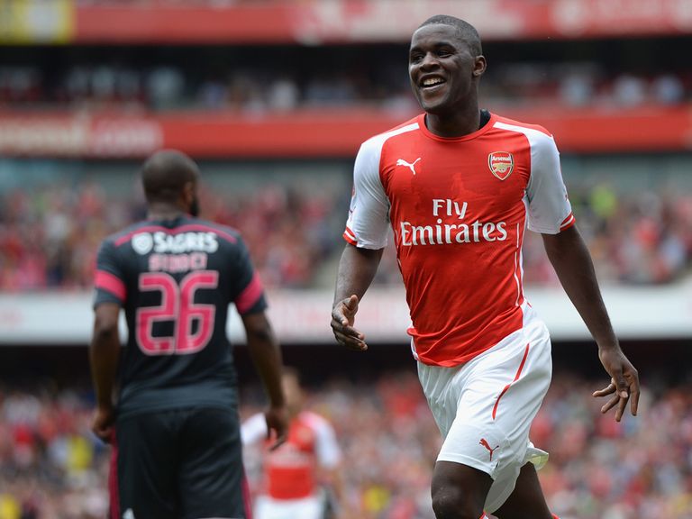 Joel Campbell celebrates his goal for Arsenal against Benfica