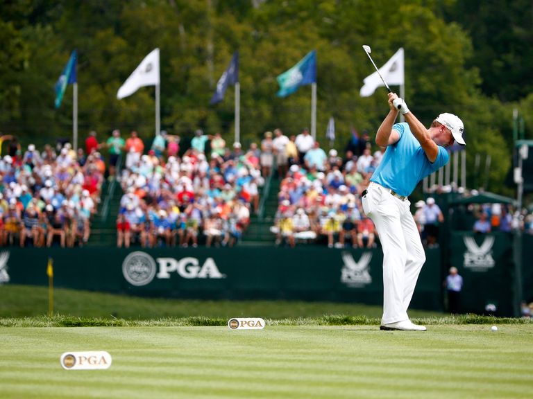 Jamie Donaldson of Wales hits his tee shot on the eighth hole
