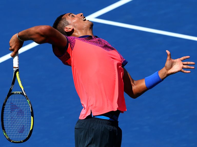 Nick Kyrgios serves on his way to victory
