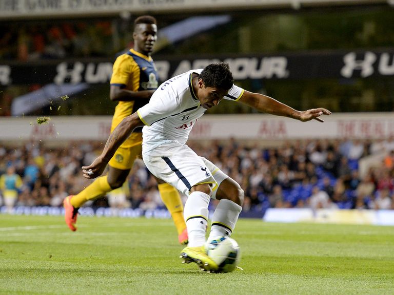 Tottenham Hotspur's Paulinho shoots to score his team's second goal