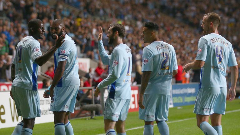 Coventry players celebrate Franck Nouble's winner