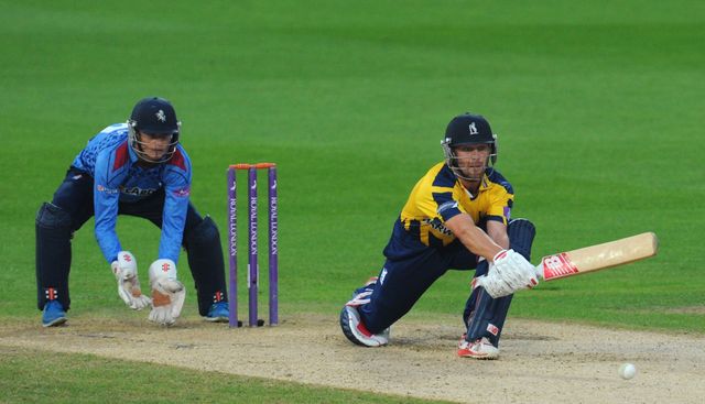 Jonathan Trott: Warwickshire No 3 reverse sweeps during his innings of 58
